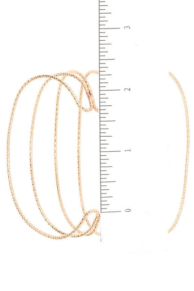 Caged flex cuff bracelet