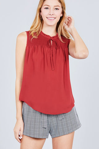 Sleeveless Ruffle Neck W/self Tie Smocked Yoke Detail Front Button Woven Top