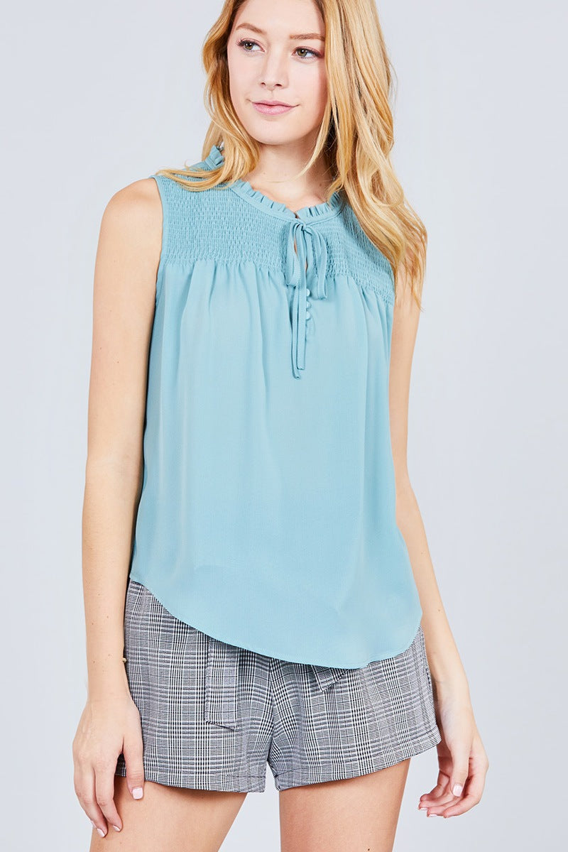 Sleeveless Ruffle Neck W/self Tie Smocked Yoke Detail Front Button Woven Top