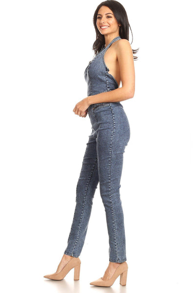 Fitted Denim Jumpsuit With Halter Neck, Low Back, And Zipper Detail