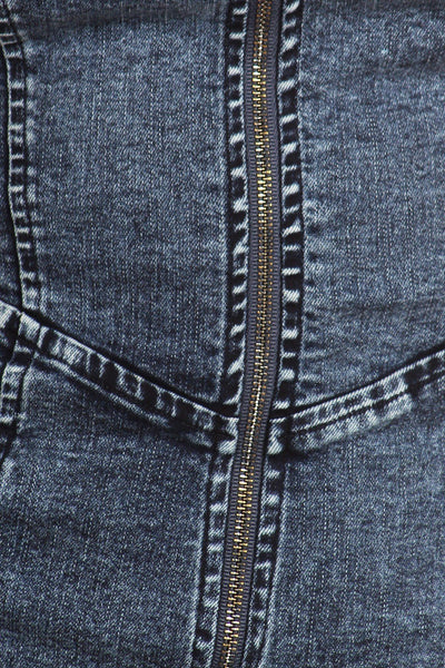 Fitted Denim Jumpsuit With Halter Neck, Low Back, And Zipper Detail